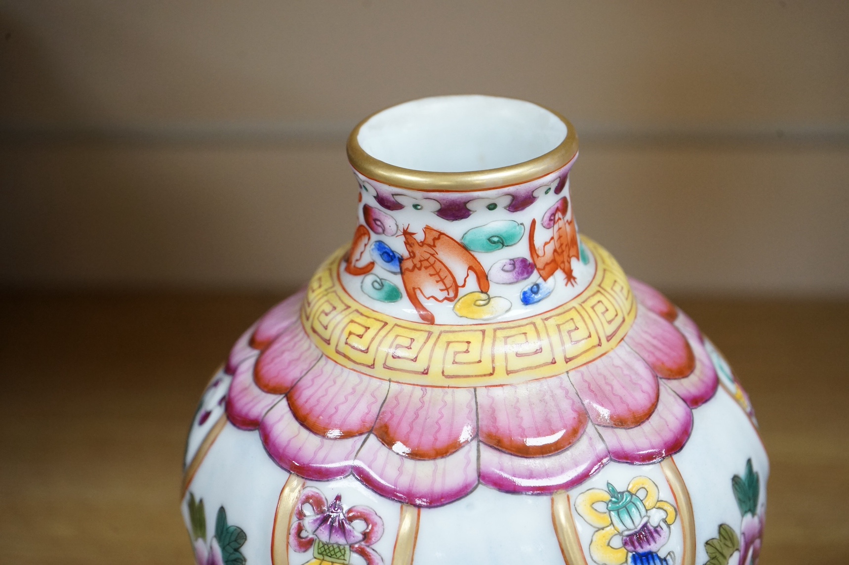 A Chinese famille rose vase enamelled with flowers, 20cm high. Condition - good